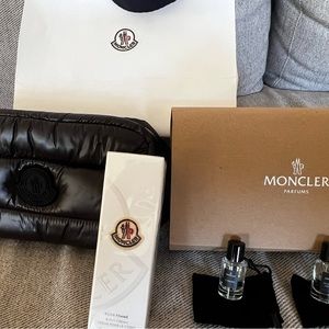 Moncler cosmetic bag, full size body lotion and 2 travel size perfumes